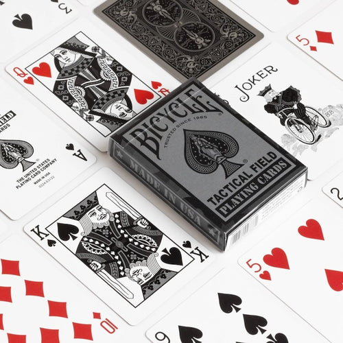 Bicycle tactical field playing cards with cards spread out on a white background