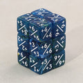 Set of blue and green dice with mathematical symbols on a light gray background