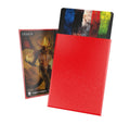 A red Matte Cortex sleeve by Ultimate Guard displayed alongside a trading card game card, showcasing the sleeve's transparency and fit.